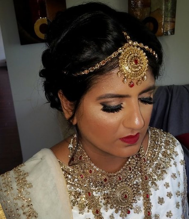 indian bride with makeup and hair done by bhavii brides wedding 